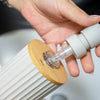 Magnetic soap dispenser and magnetic toothbrush cup including pads